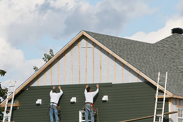 Professional Siding Replacement technician working in Dinwiddie, VA